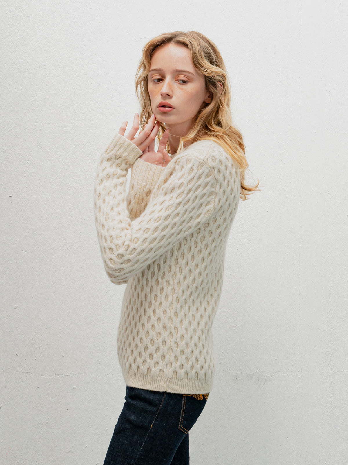 White cable knit sweater