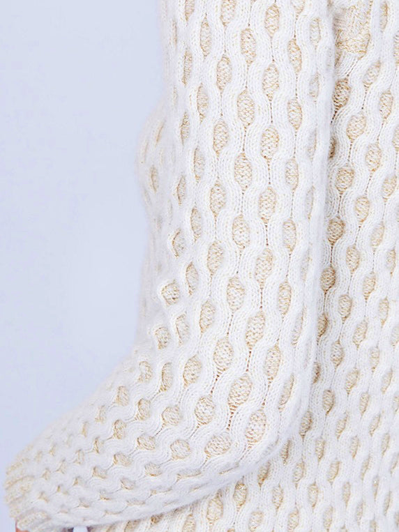 White cable knit sweater